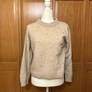 Pink sweater with pearls